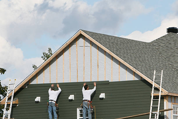 Professional Emergency Siding Repair technician working in Oakdale, NY